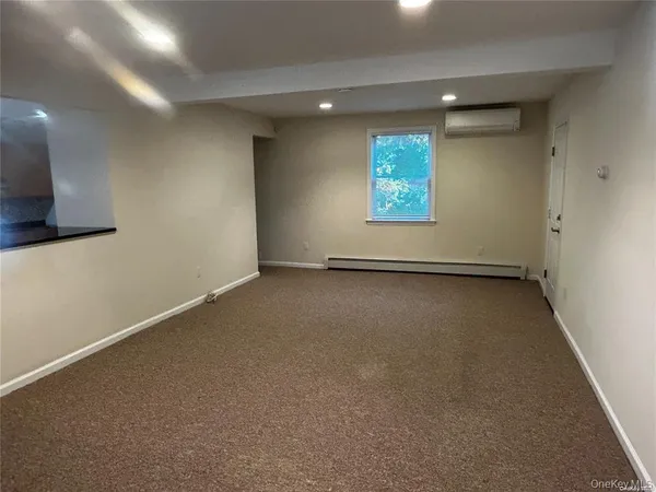 a view of a hallway with workspace