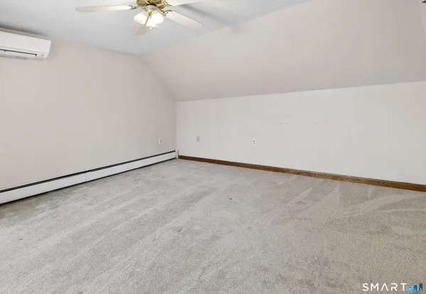 a bathroom with a shower and a sink