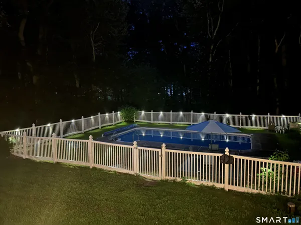 a view of a balcony with small garden