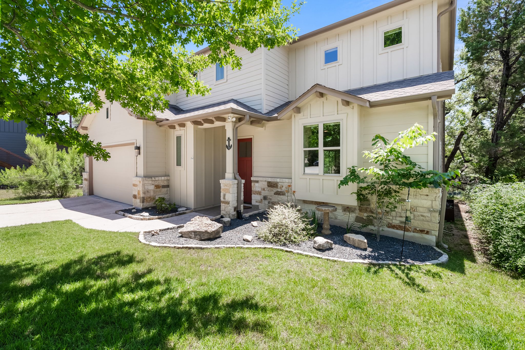14213 Red Feather Trail Austin, TX 78734 - Photo 1 of 39 a view of a house with backyard and sitting area