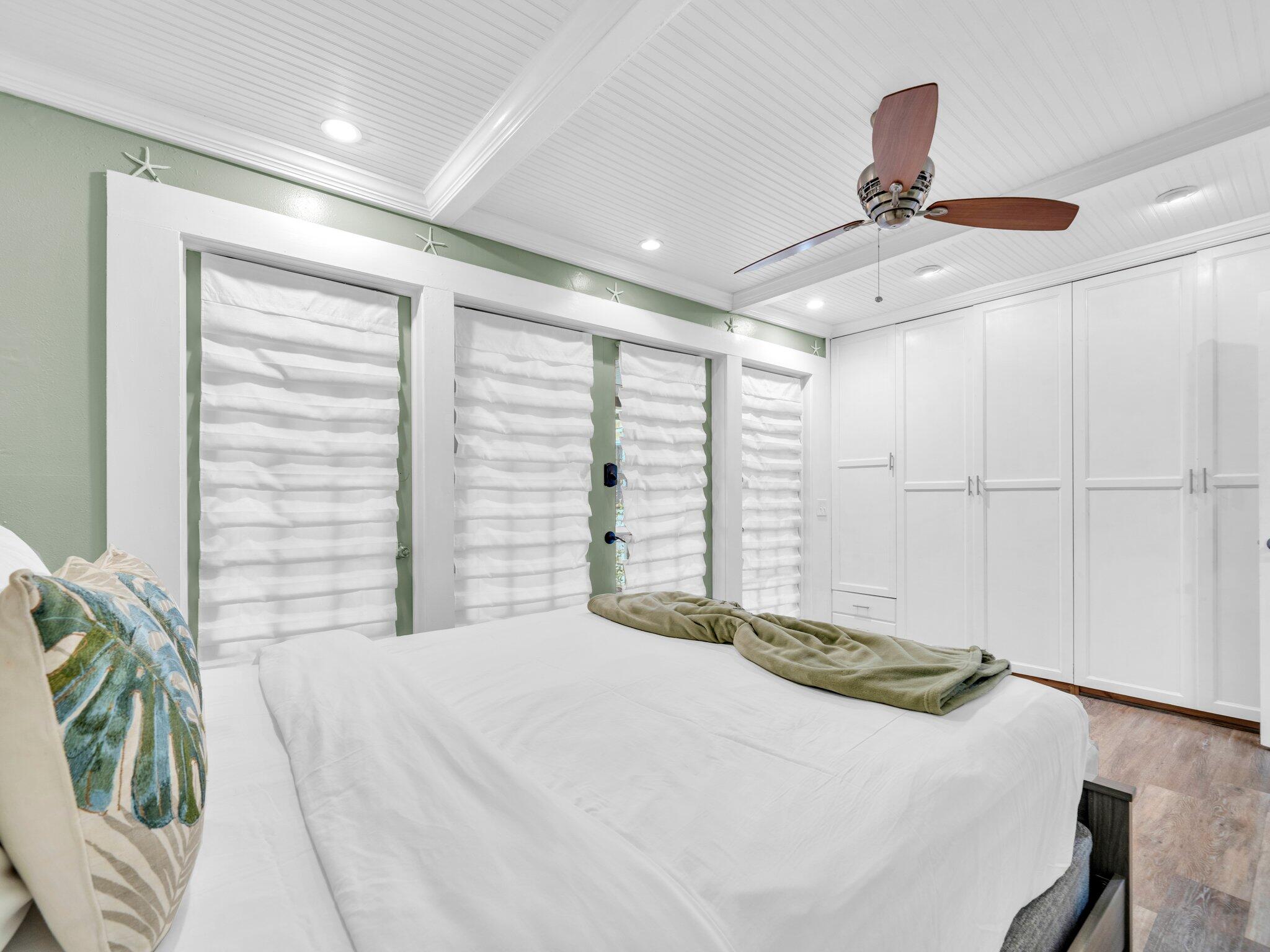 50 Gossamer Lane, Unit 10 Inlet Beach, FL 32461 - Photo 14 of 46 a bedroom with a bed and a large window