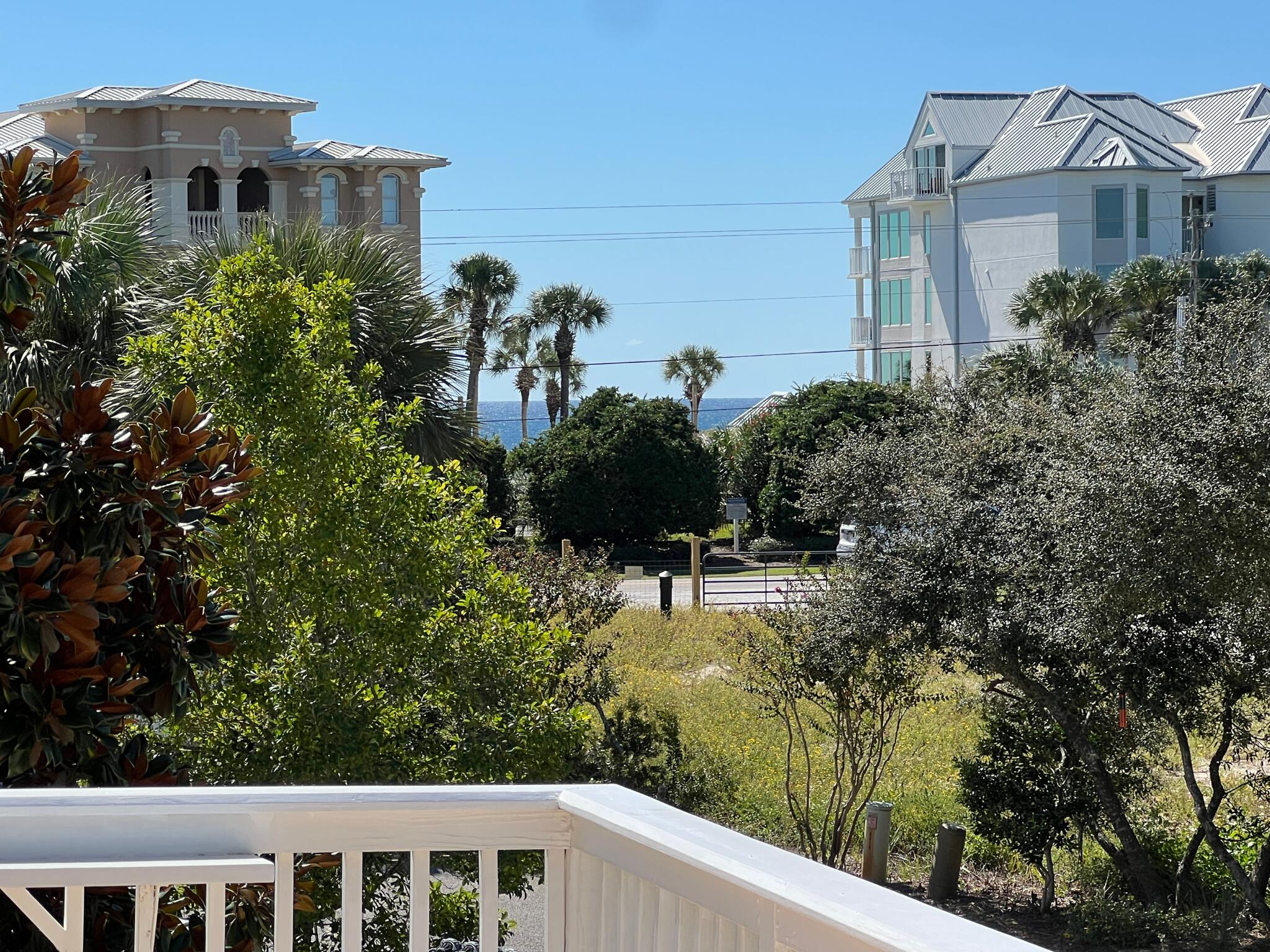 50 Gossamer Lane, Unit 10 Inlet Beach, FL 32461 - Photo 2 of 46 a view of a house with a yard and plants