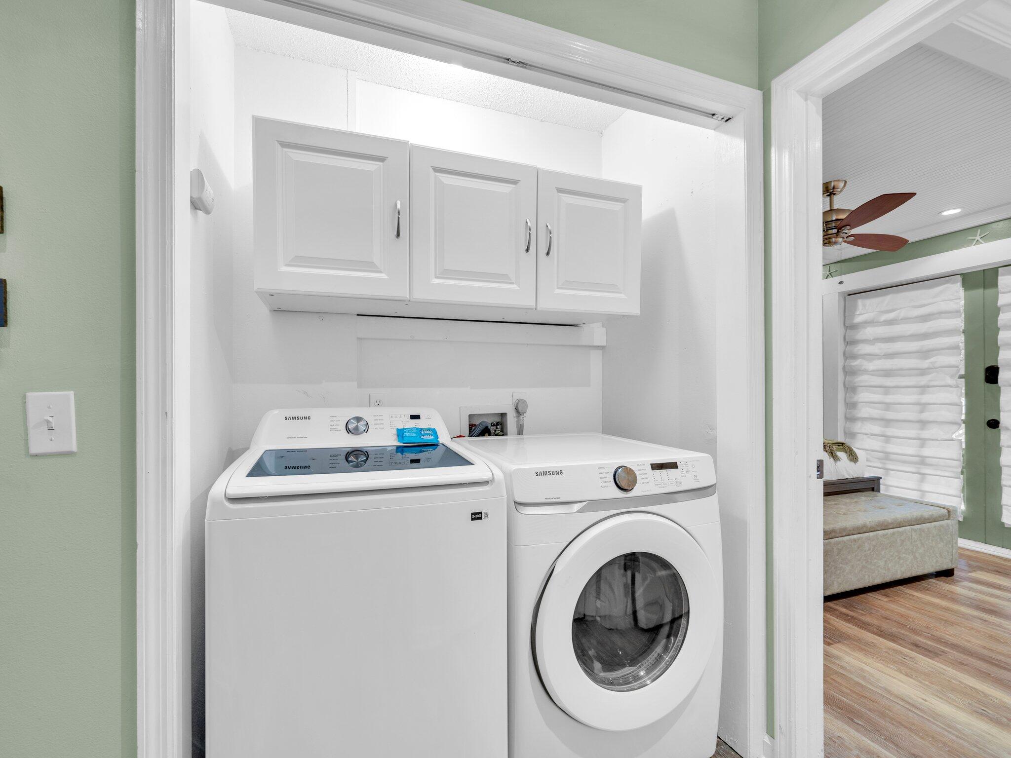 50 Gossamer Lane, Unit 10 Inlet Beach, FL 32461 - Photo 23 of 46 a utility room with dryer and washer