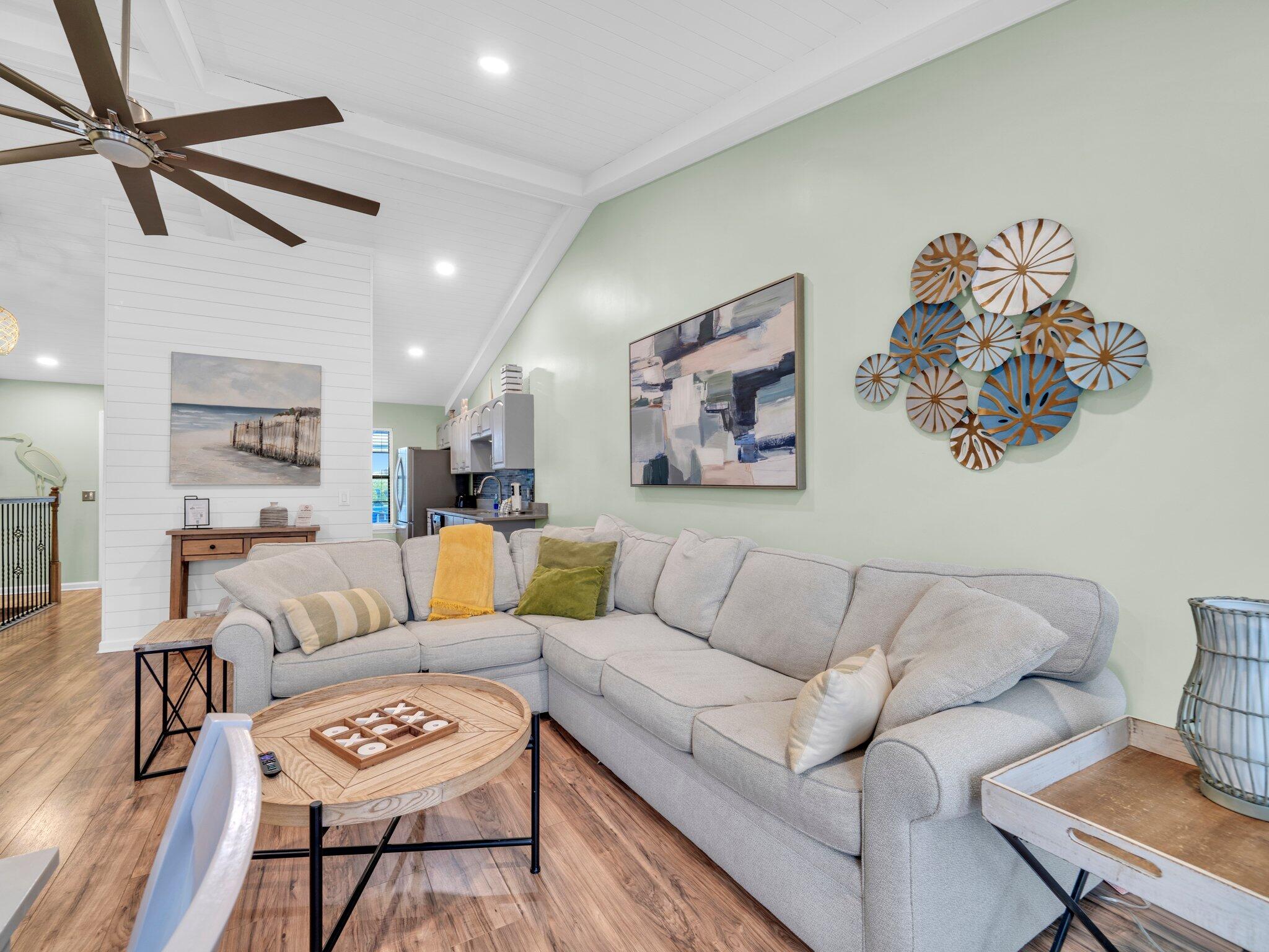 50 Gossamer Lane, Unit 10 Inlet Beach, FL 32461 - Photo 33 of 46 a living room with furniture a couch and a coffee table