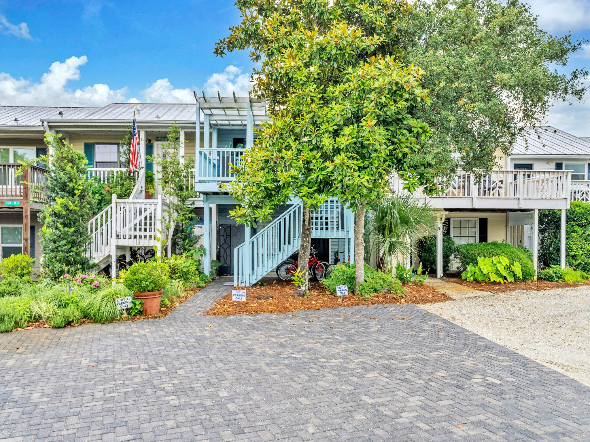 50 Gossamer Lane, Unit 10 Inlet Beach, FL 32461 - Photo 41 of 46 a front view of house with yard and green space