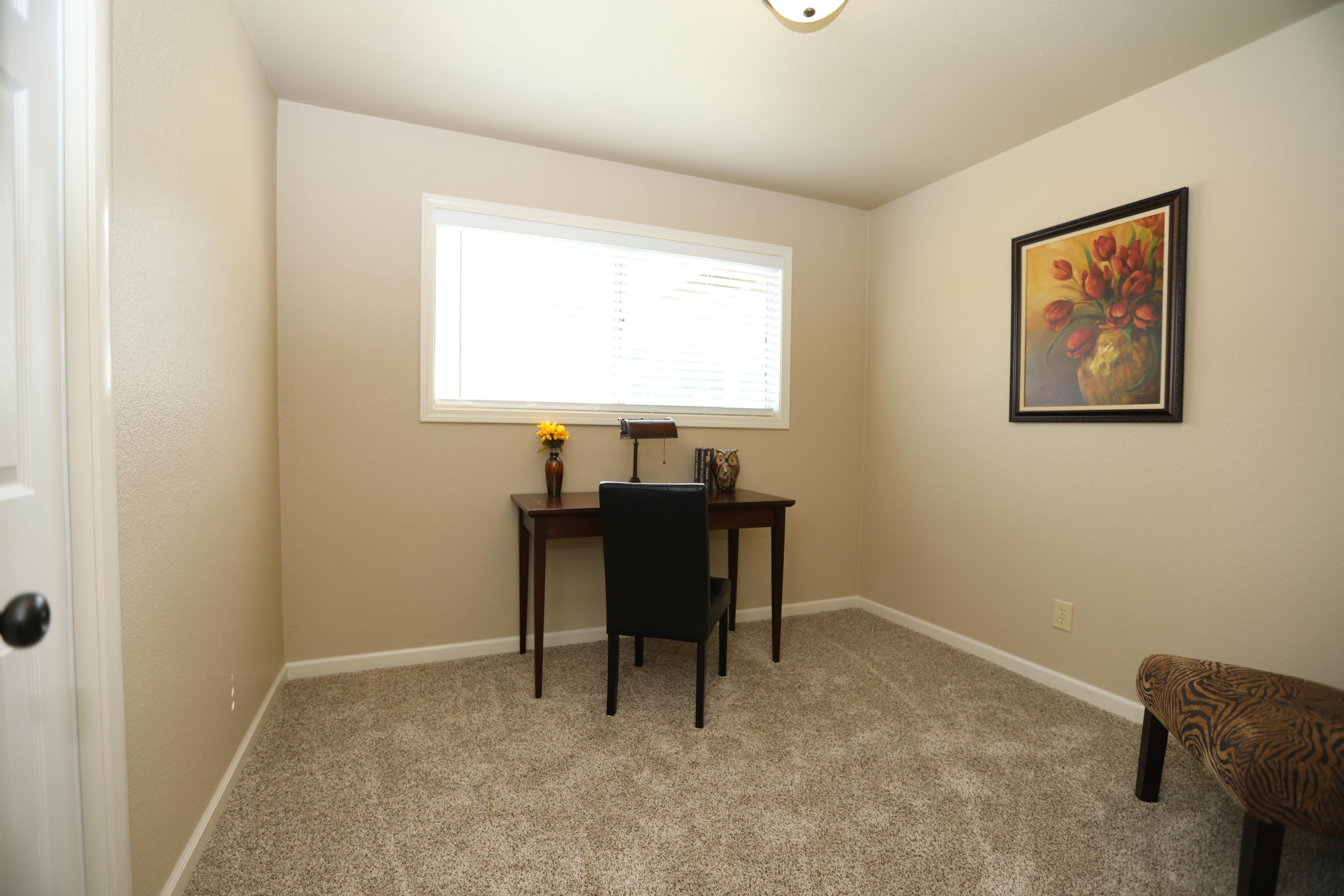 6560 Riverside Drive Redding, CA 96001 - Photo 8 of 15 a workspace with furniture and a window