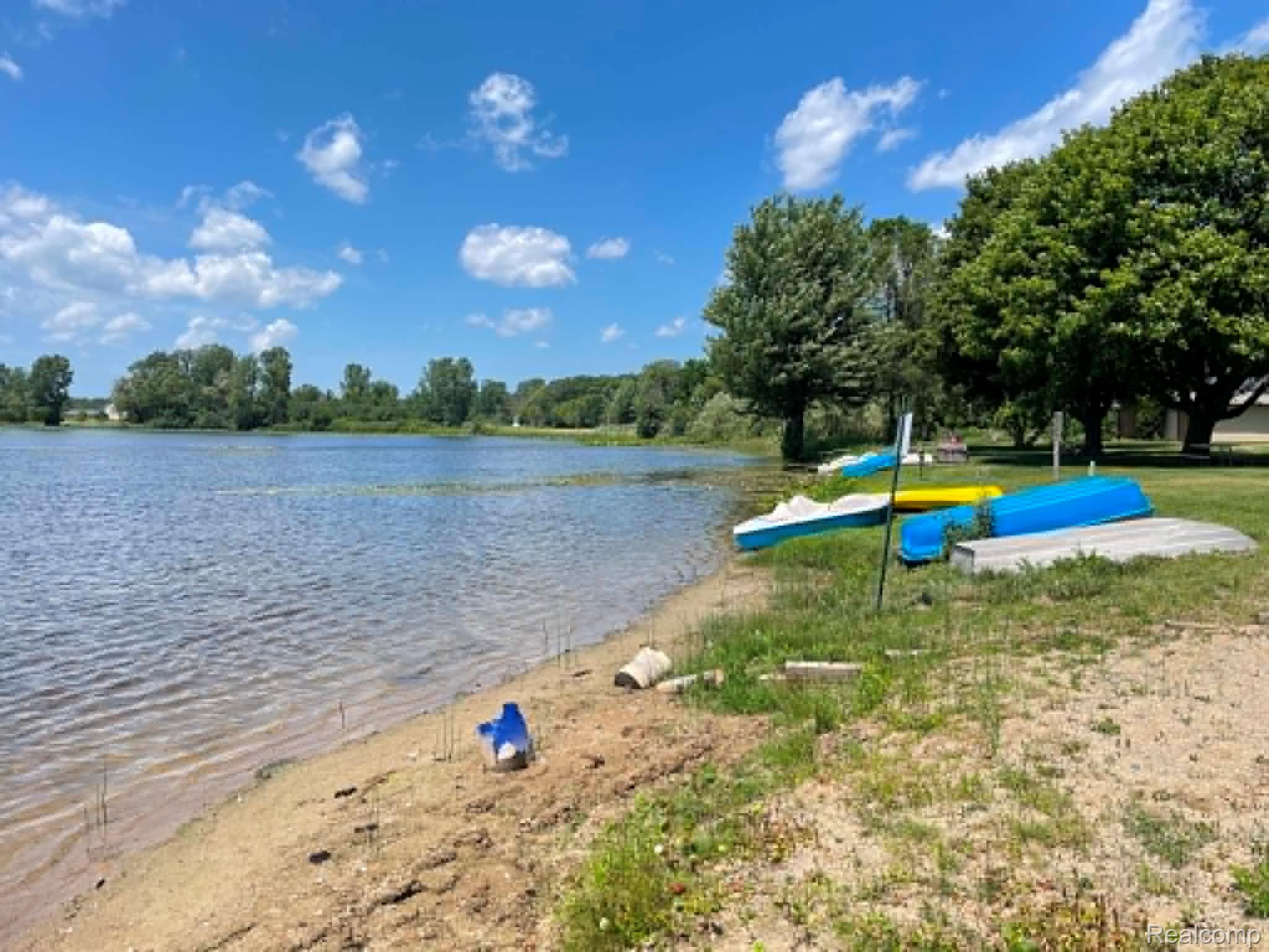 26965 Milford Road, Unit 37 New Hudson, MI 48165 - Photo 13 of 15 Beach area, right out back