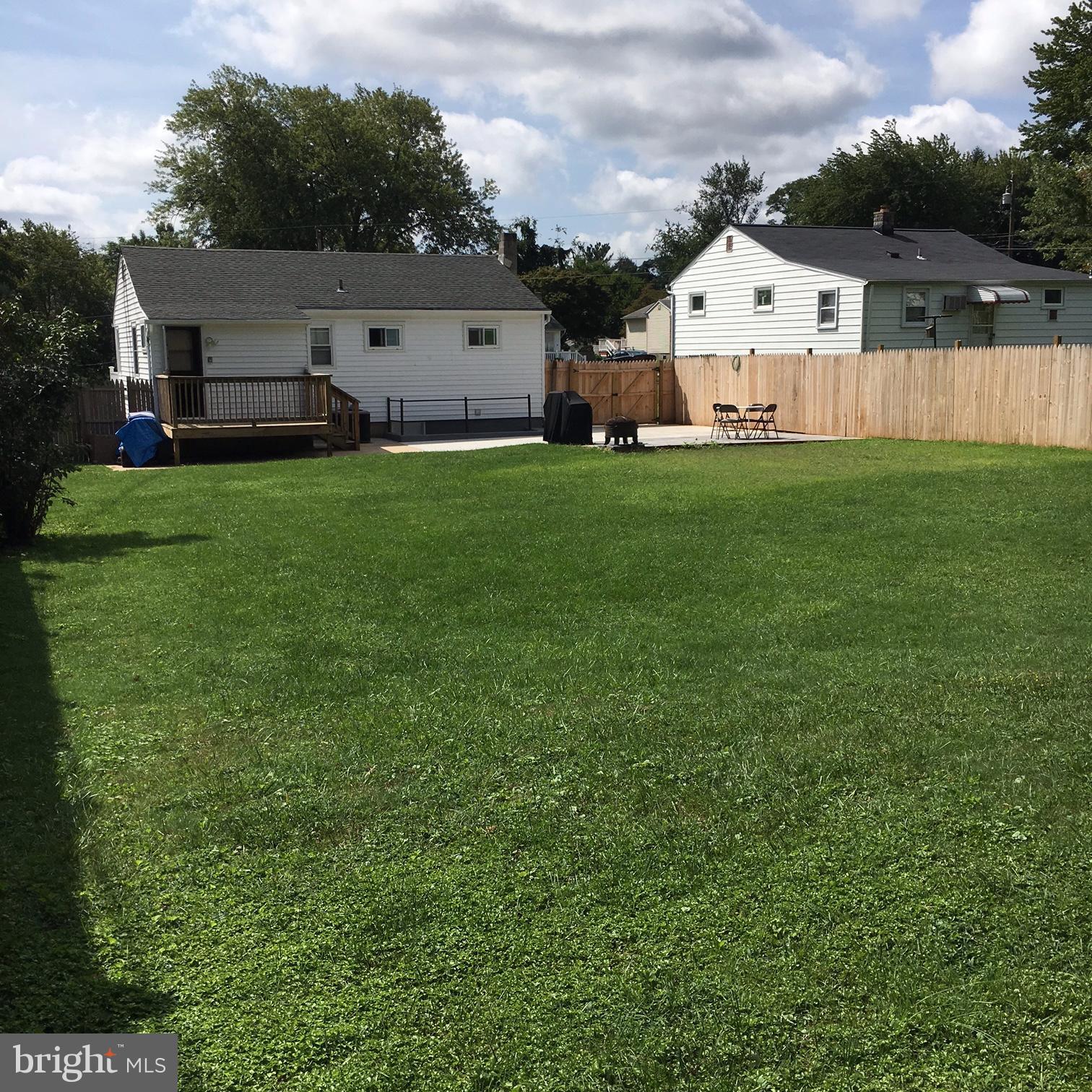 Beautiful large, flat fenced-in yard