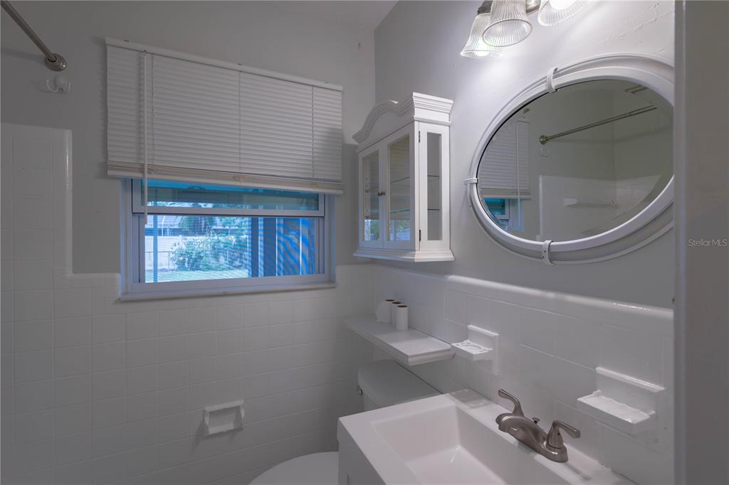 314 4th Avenue Southwest Ruskin, FL 33570 - Photo 18 of 30 a bathroom with a sink and a mirror