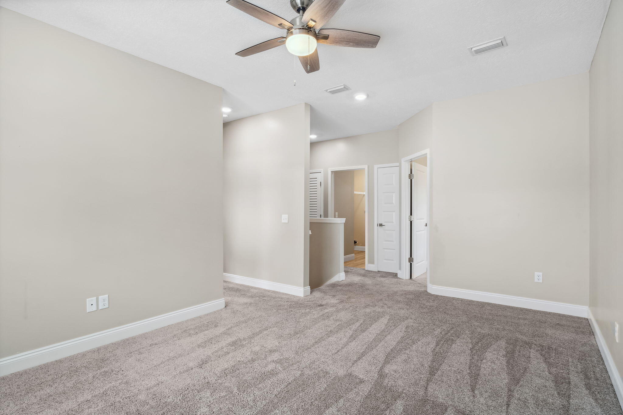 275 Indian Woman Road Santa Rosa Beach, FL 32459 - Photo 31 of 41 wooden floor in an empty room with a window