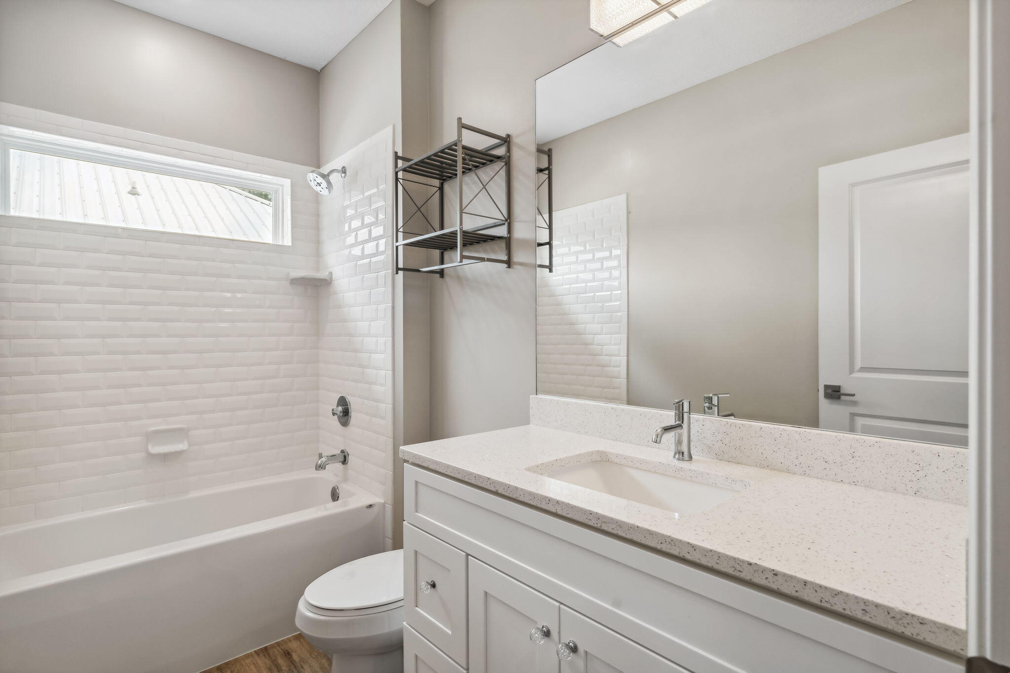 275 Indian Woman Road Santa Rosa Beach, FL 32459 - Photo 32 of 41 a bathroom with a sink a toilet and a bathtub