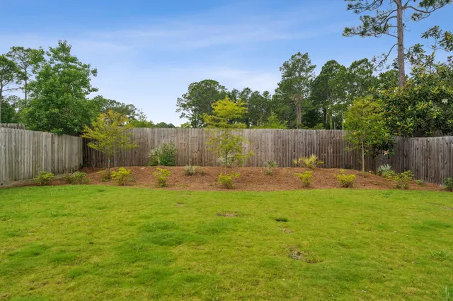 a view of a backyard with a garden