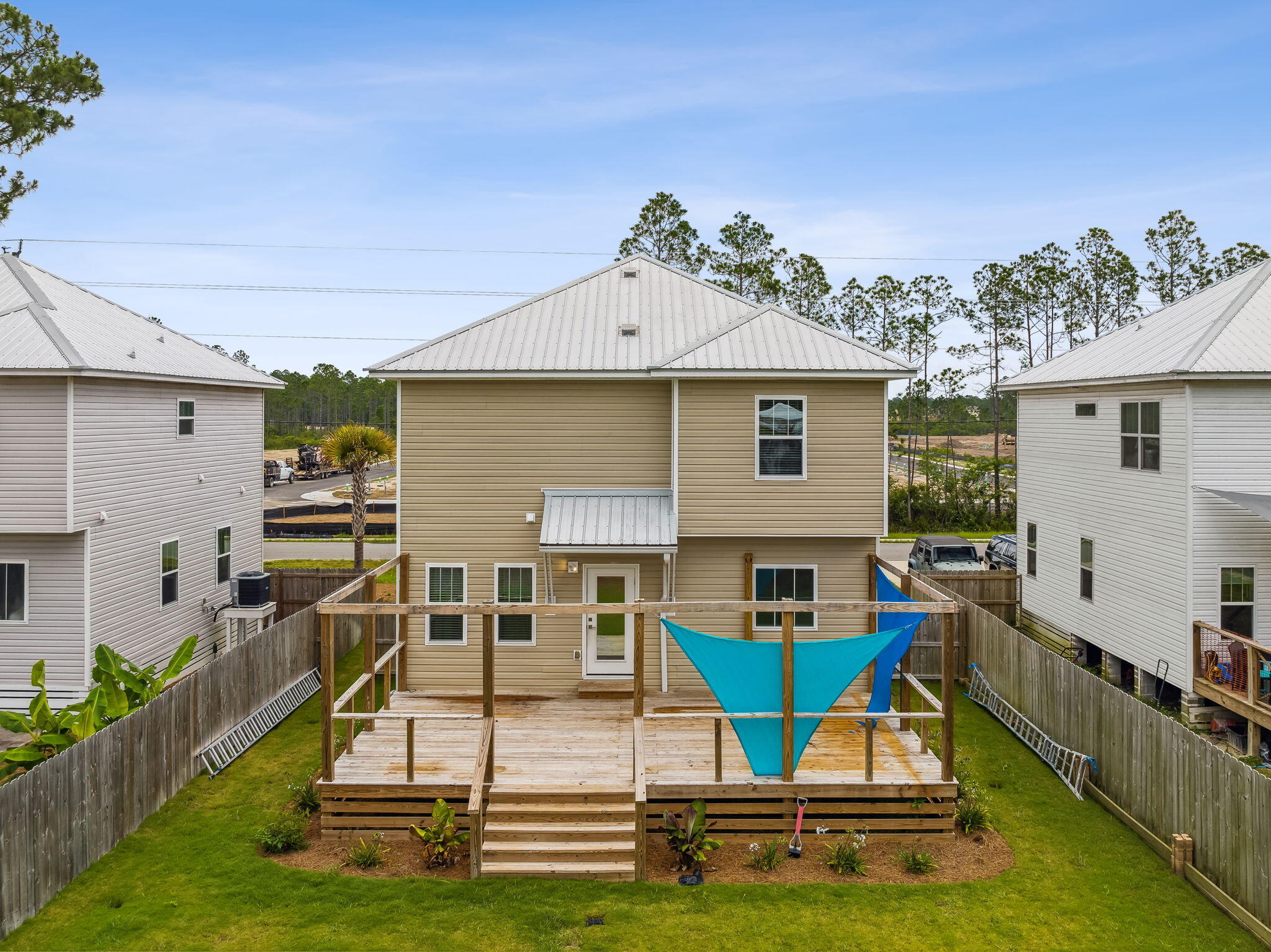 275 Indian Woman Road Santa Rosa Beach, FL 32459 - Photo 41 of 41 a view of a house with backyard porch and sitting area