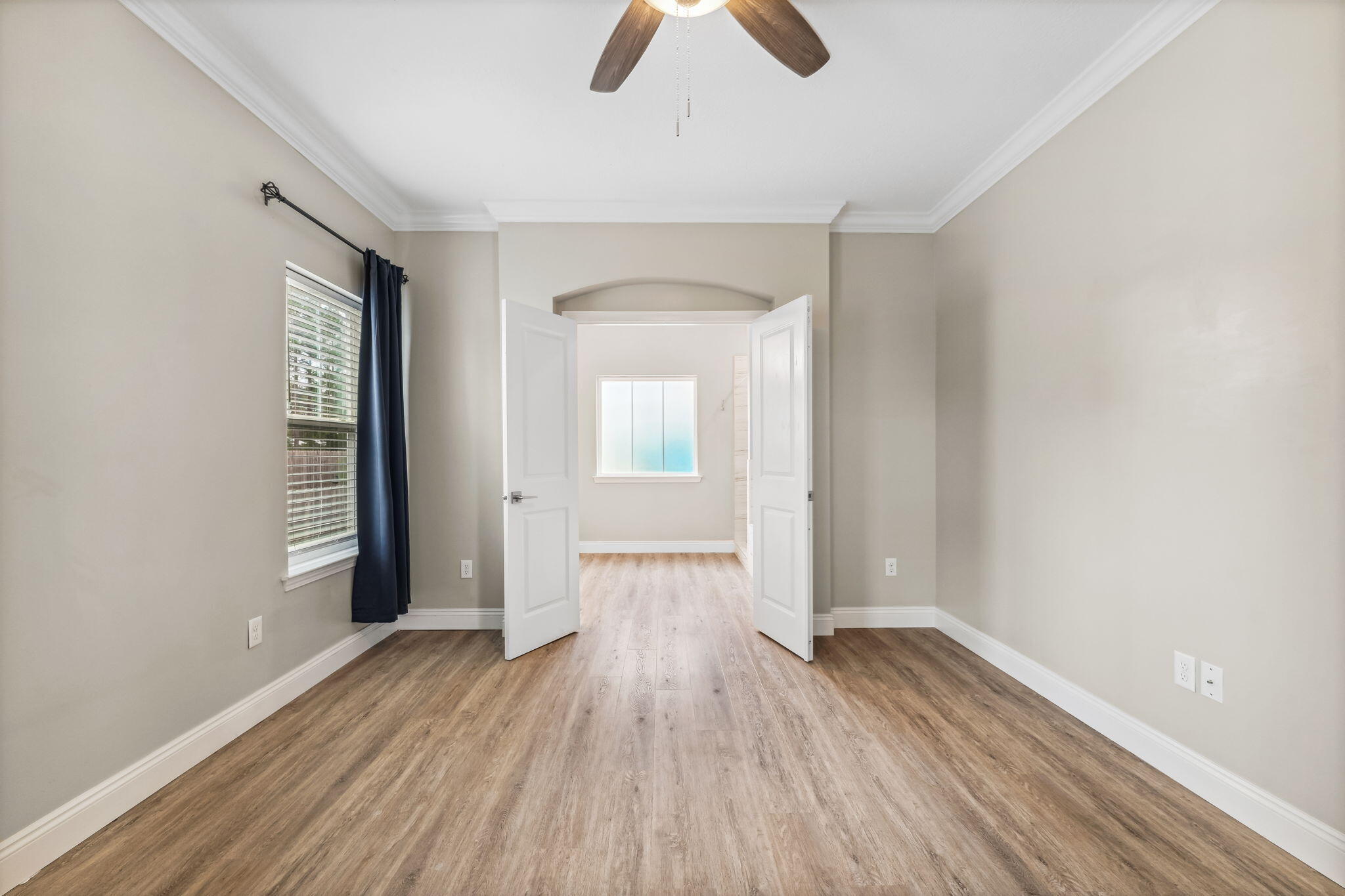 275 Indian Woman Road Santa Rosa Beach, FL 32459 - Photo 7 of 41 wooden floor in an empty room with a window