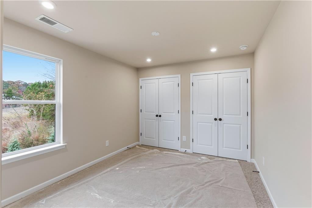 373 Waterbluff Drive Southwest Mableton, GA 30126 - Photo 15 of 21 a view of an empty room with a window