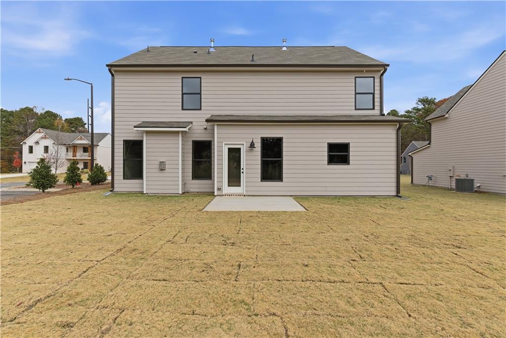 373 Waterbluff Drive Southwest Mableton, GA 30126 - Photo 19 of 21 a view of a house with backyard