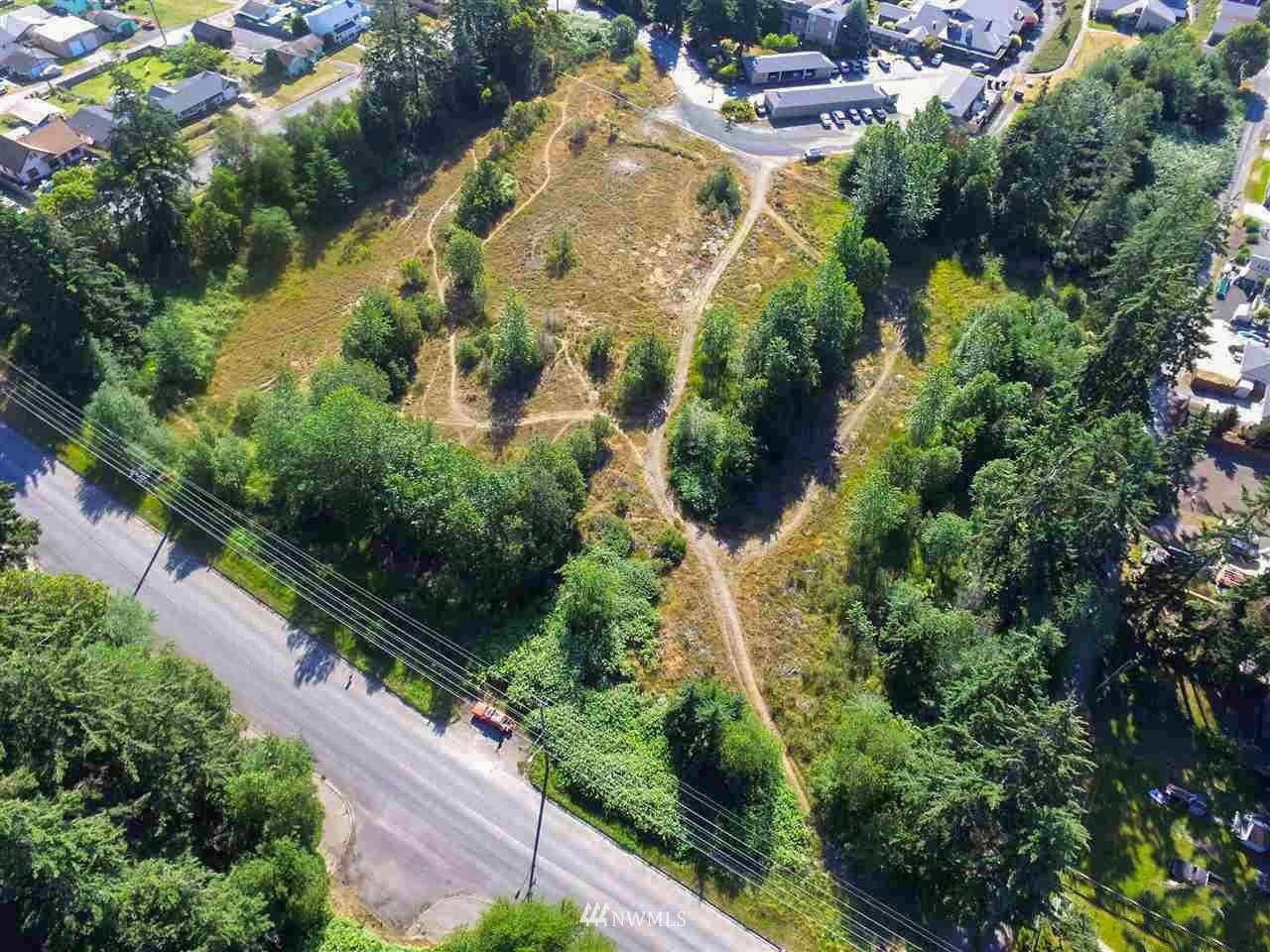0 West 8th Street Port Angeles, WA 98363 - Photo 3 of 40 an aerial view of a house with a yard