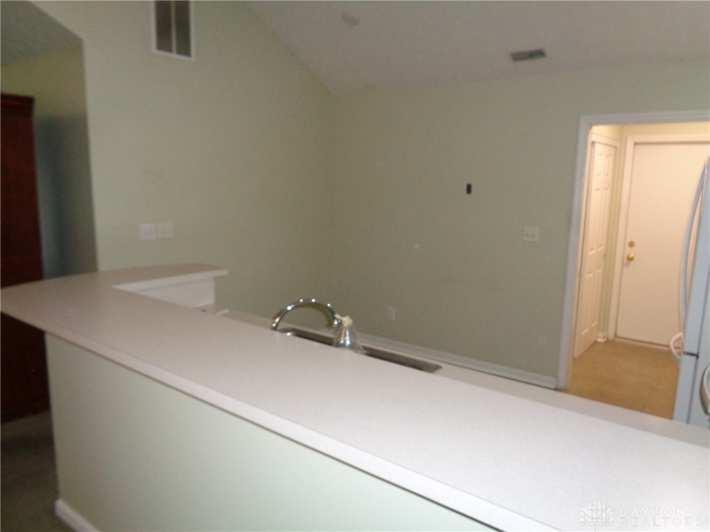 80 Villa Pointe Drive Springboro, OH 45066 - Photo 10 of 19 This spacious kitchen offers ample counter space, a convenient breakfast bar, and vaulted ceilings.