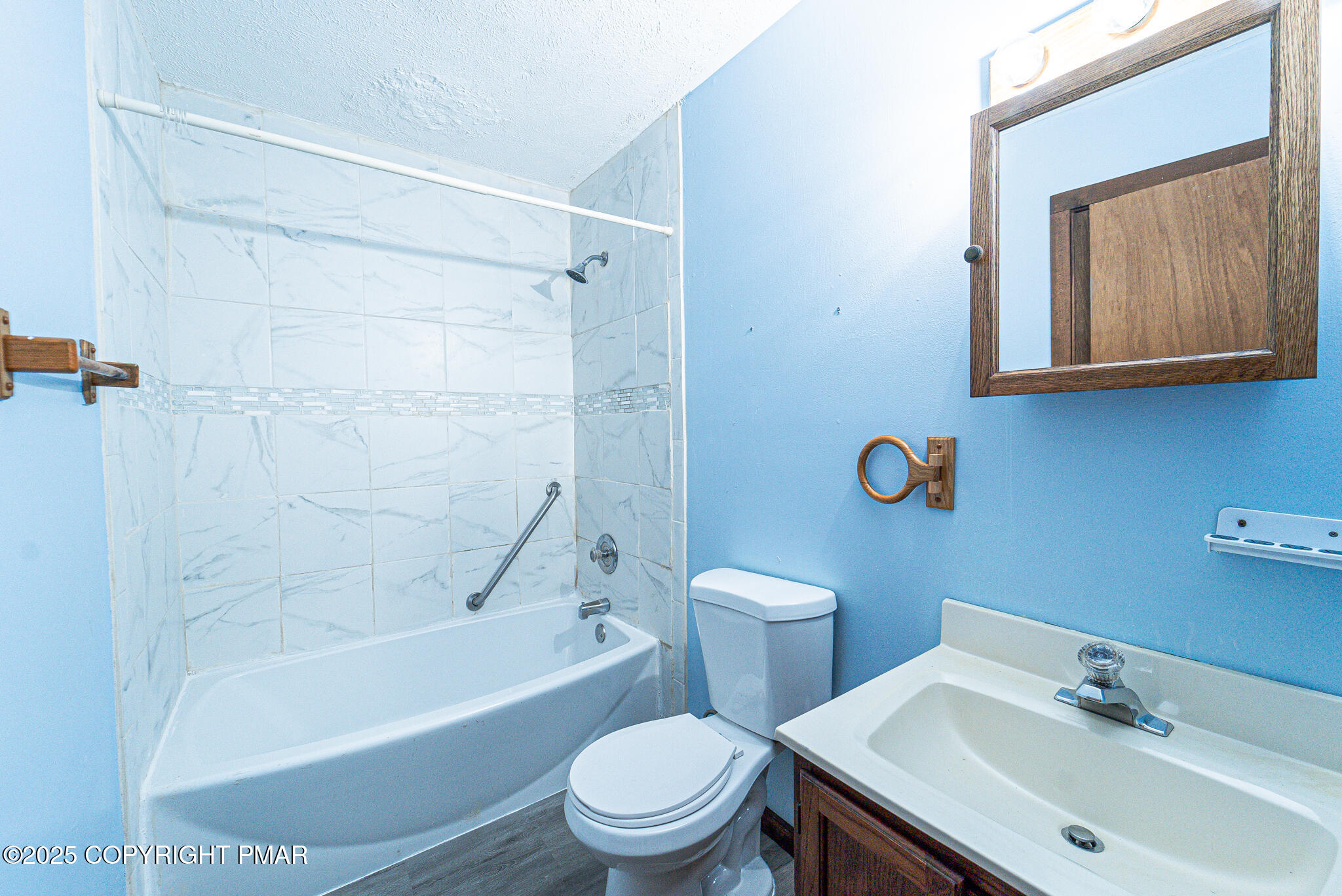 1562 Oak Lane Bushkill, PA 18324 - Photo 23 of 27 a bathroom with a sink toilet and a bathtub
