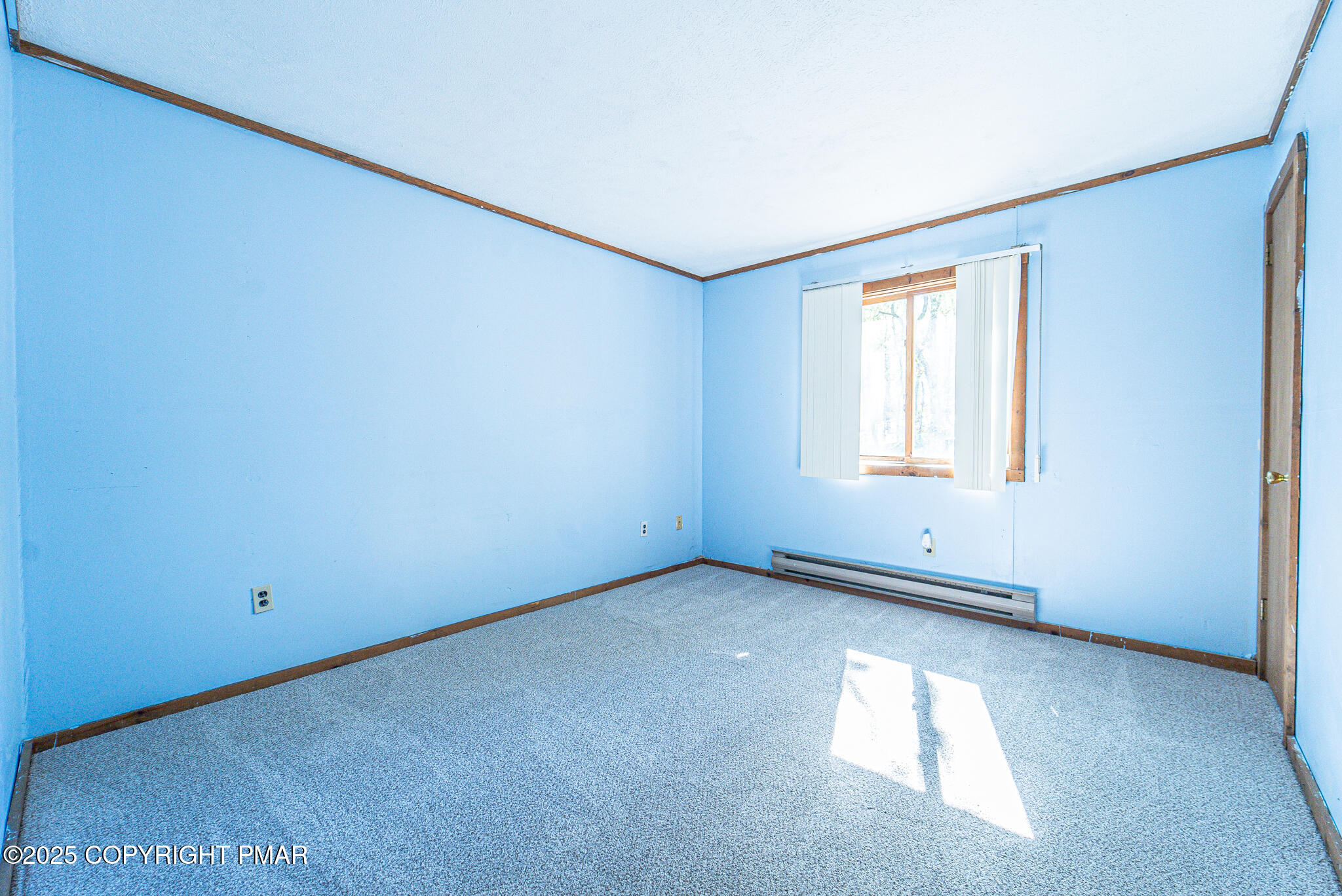1562 Oak Lane Bushkill, PA 18324 - Photo 25 of 27 an empty room with windows