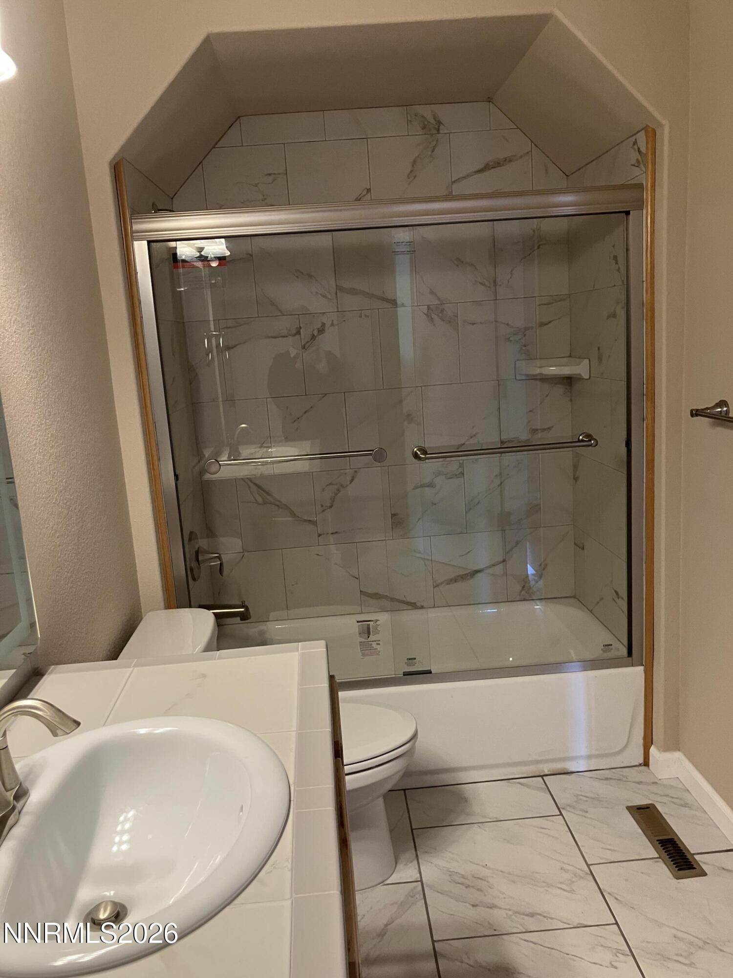 5 Pit Road Wellington, NV 89444 - Photo 12 of 38 a bathroom with a bathtub and a shower