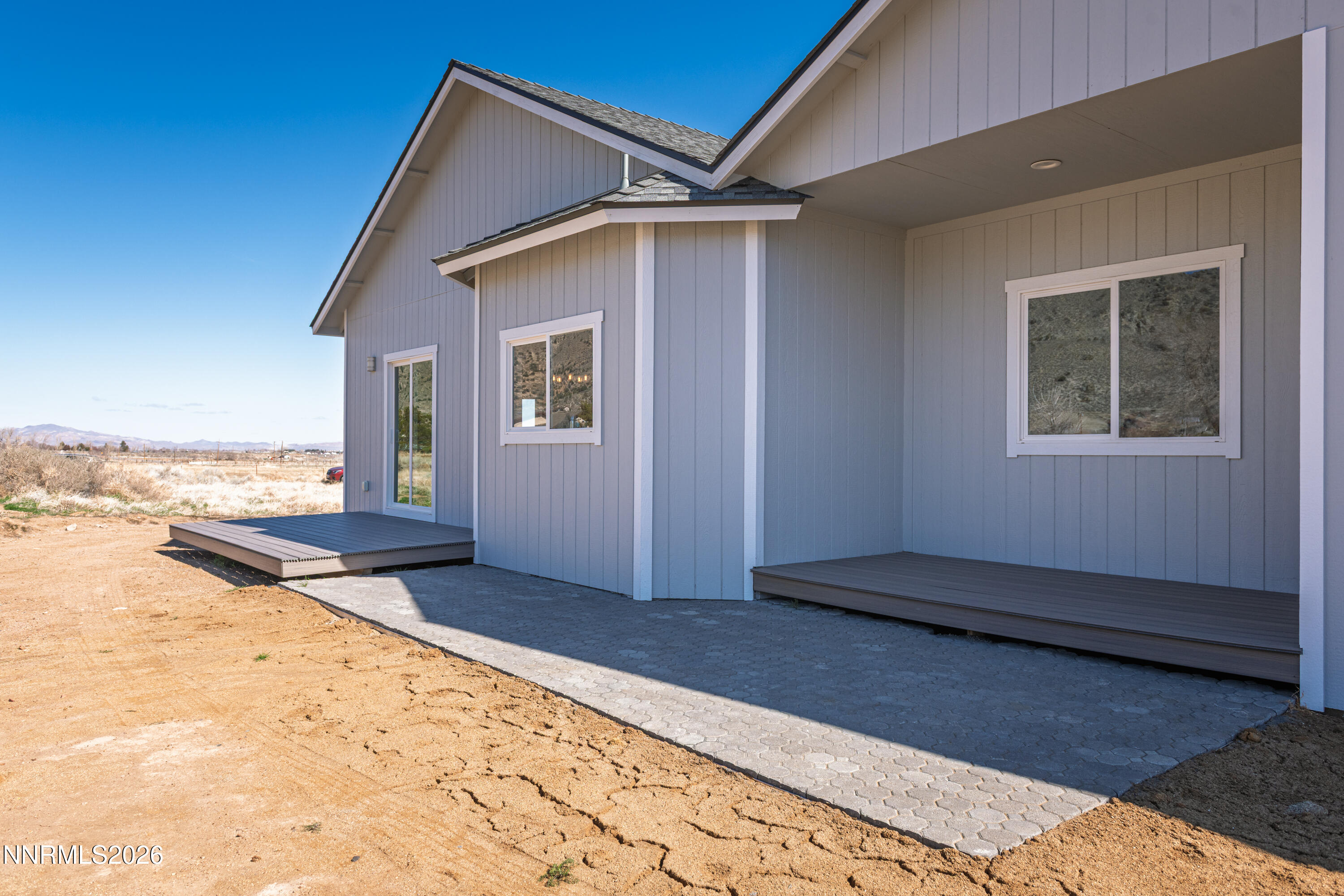 5 Pit Road Wellington, NV 89444 - Photo 21 of 51 a house with trees in the background