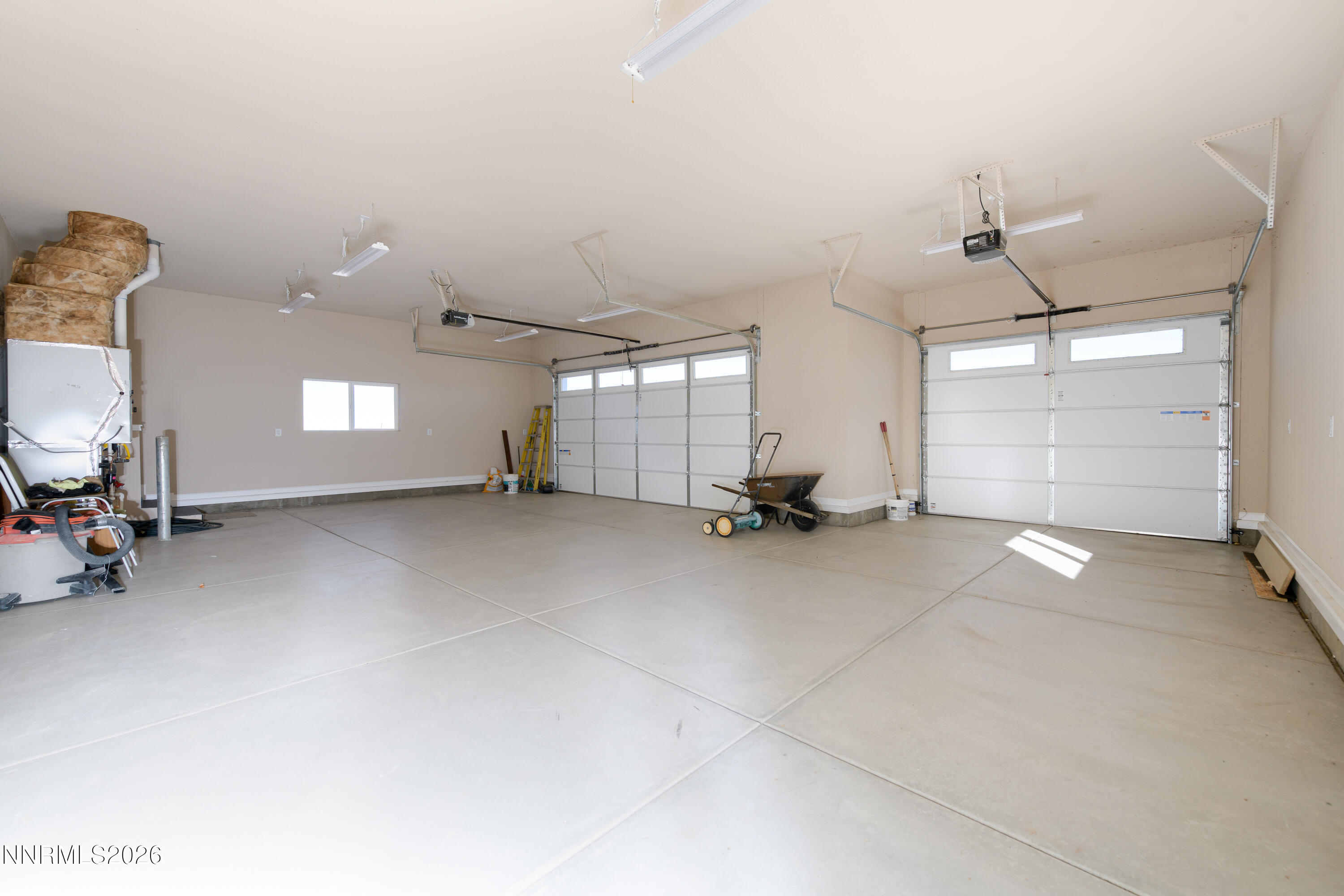 5 Pit Road Wellington, NV 89444 - Photo 48 of 51 a view of a room with gym equipment and a chandelier