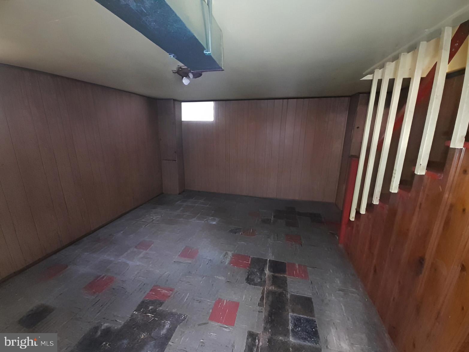 5619 Wesley Avenue Baltimore, MD 21207 - Photo 14 of 39 an empty room with windows