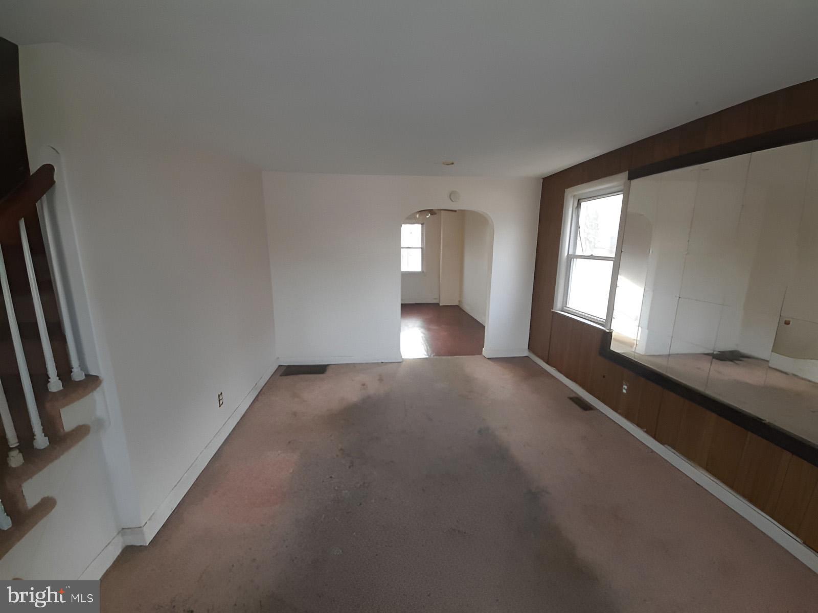 5619 Wesley Avenue Baltimore, MD 21207 - Photo 4 of 39 a view of gallery and hall with wooden floor