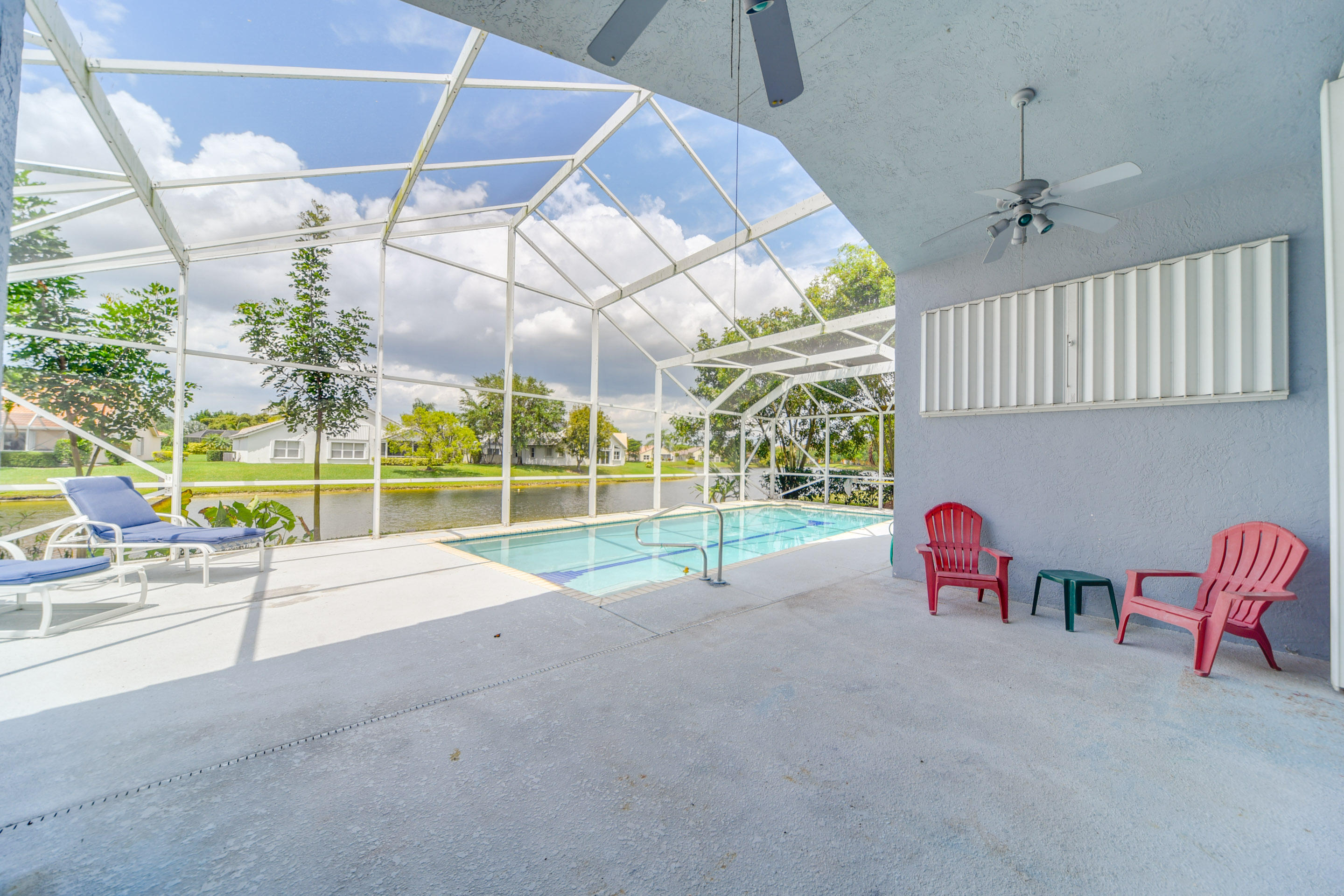 172 Cove Road Greenacres, FL 33413 - Photo 28 of 39 COVE POOL PATIO VIEW