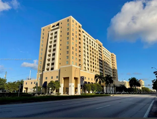 a view of a livingroom with a sink and chandelier