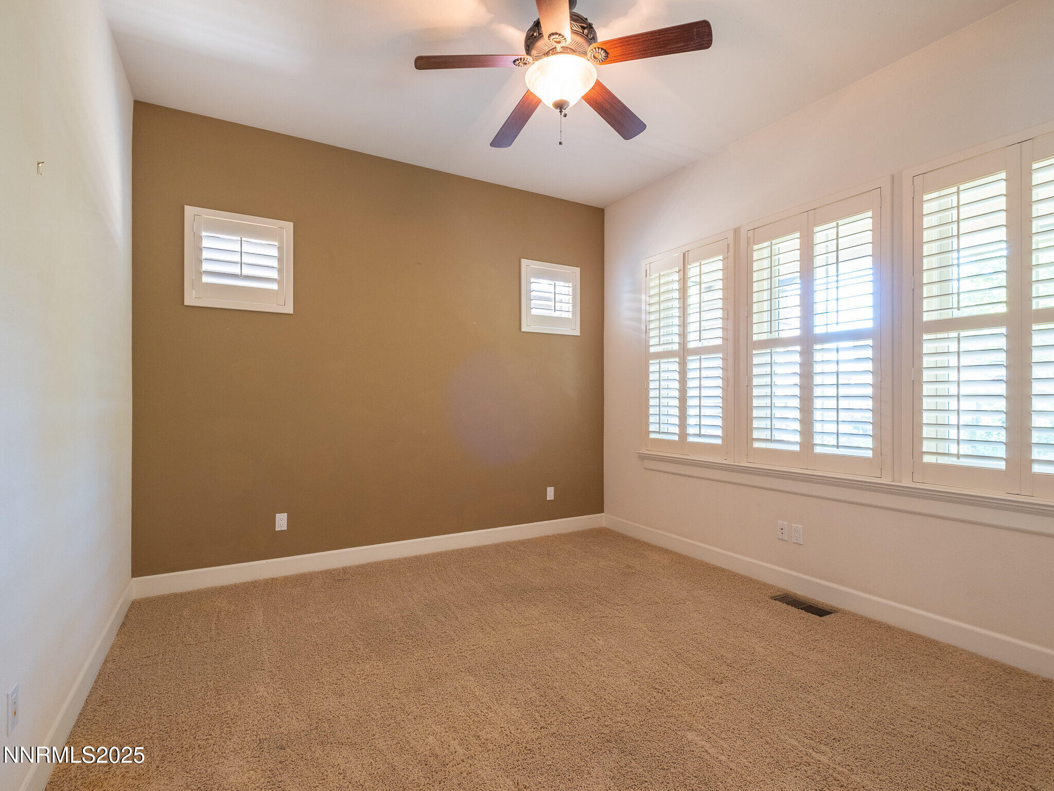 3985 San Donato Loop Reno, NV 89519 - Photo 16 of 29 a view of an empty room with a window