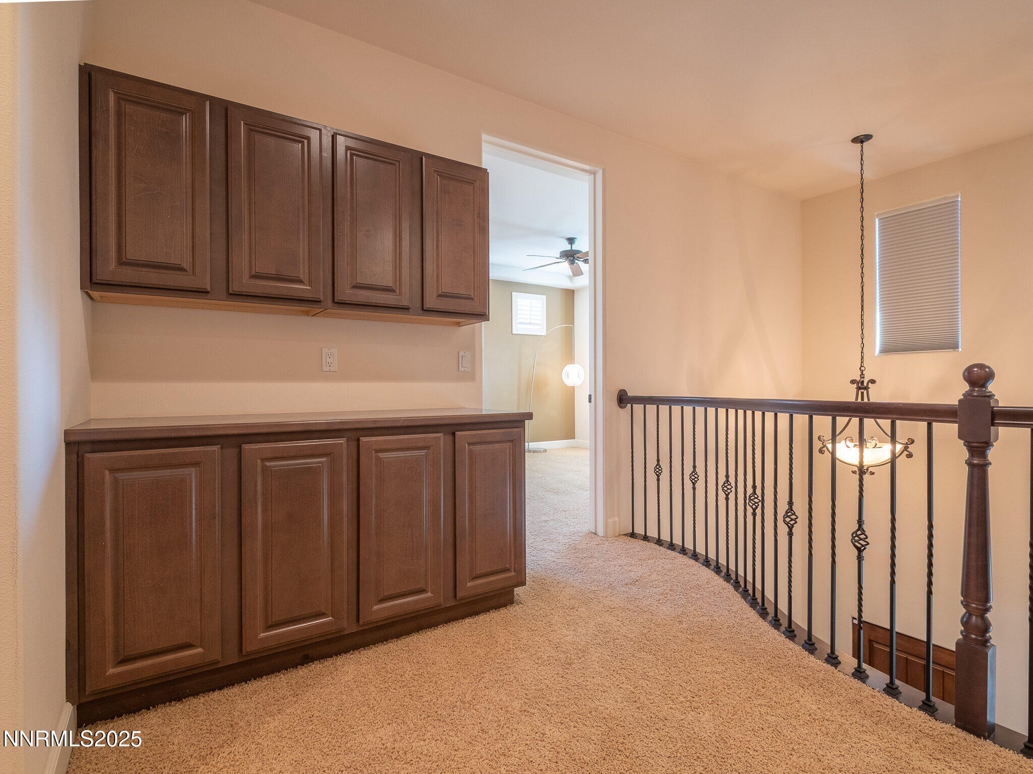 3985 San Donato Loop Reno, NV 89519 - Photo 20 of 29 a kitchen with wooden cabinets