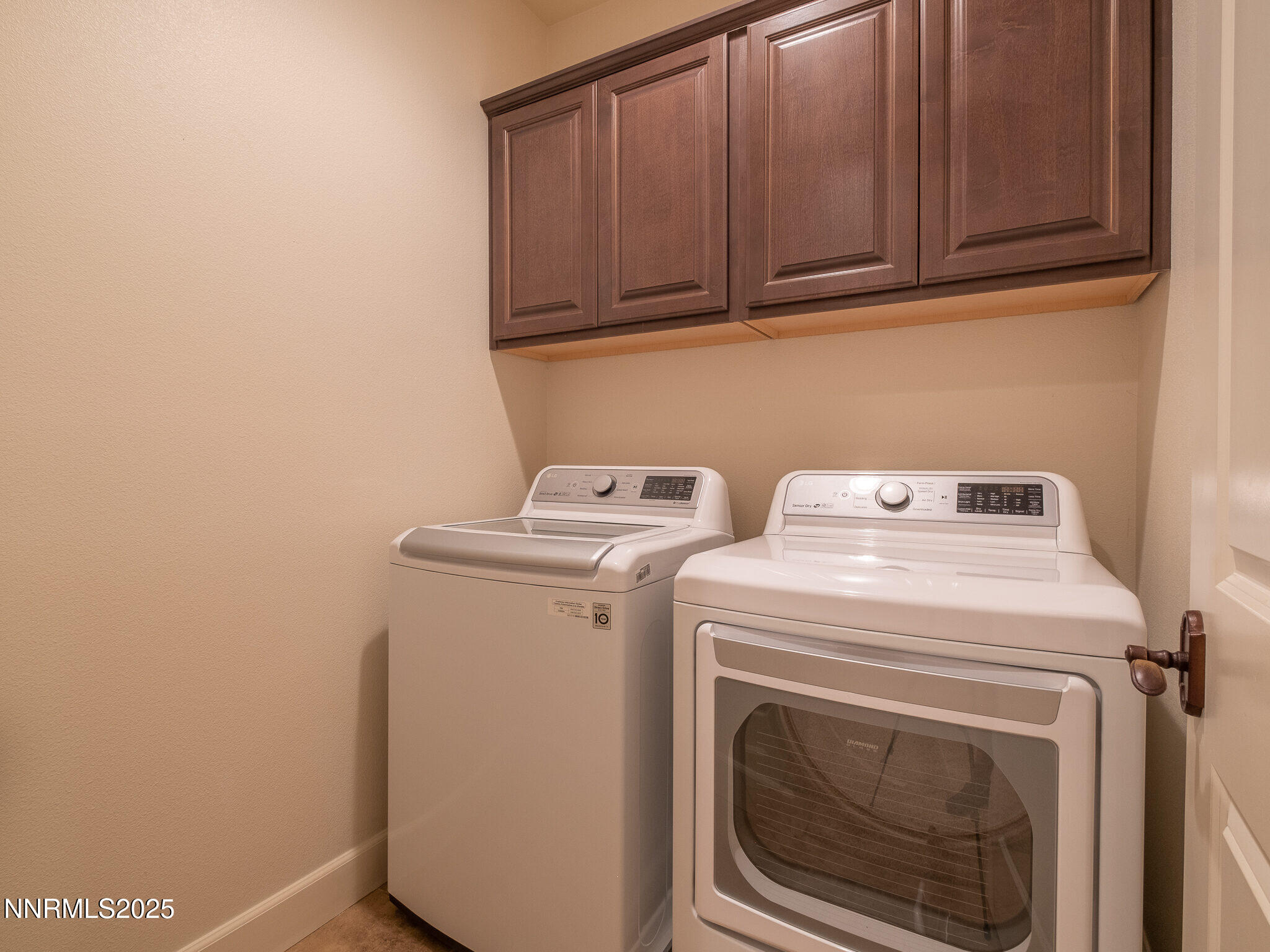 3985 San Donato Loop Reno, NV 89519 - Photo 22 of 29 a utility room with dryer and washer