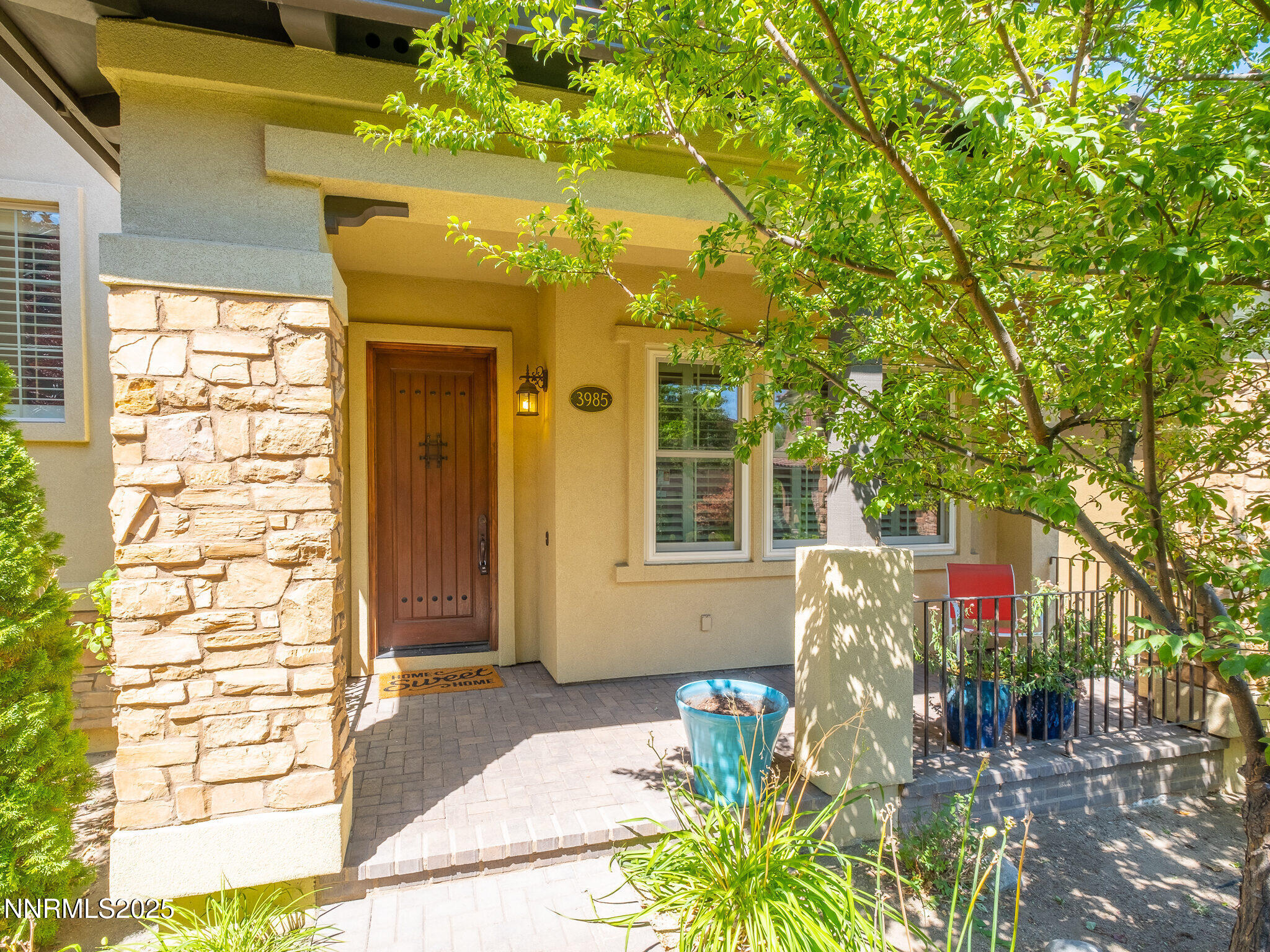 3985 San Donato Loop Reno, NV 89519 - Photo 29 of 29 a front view of a house with a yard
