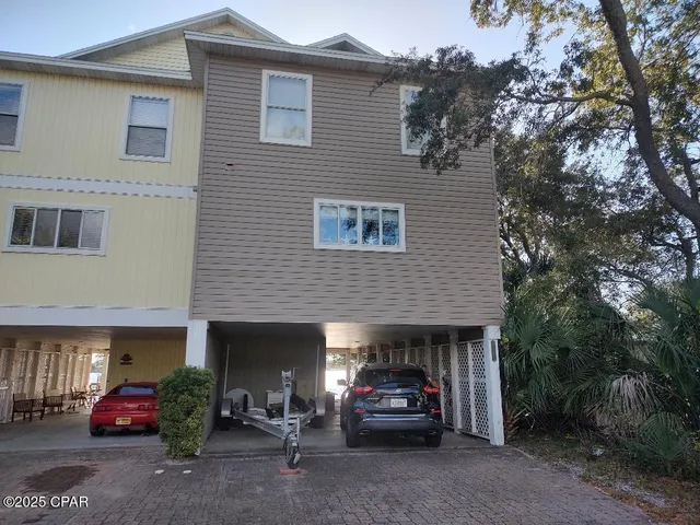 $720,000 | 5833 North Lagoon Drive, Unit A, Panama City Beach, FL 32408