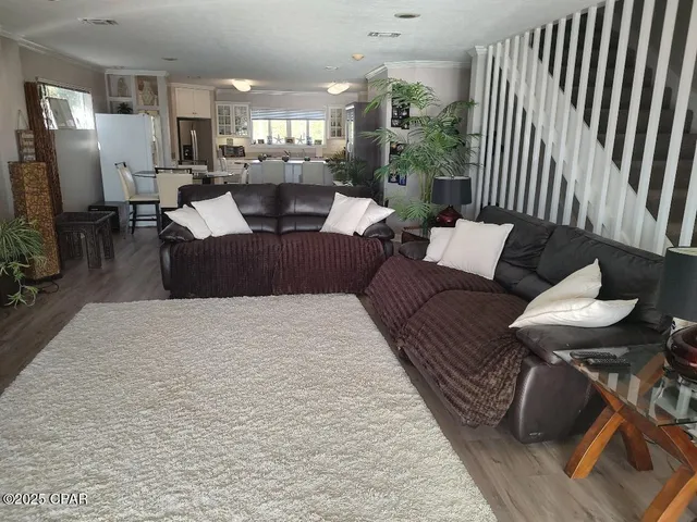 $720,000 | 5833 North Lagoon Drive, Unit A, Panama City Beach, FL 32408