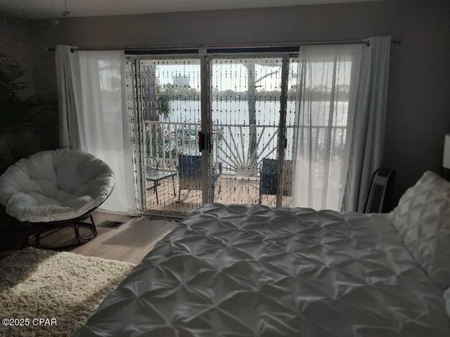 $720,000 | 5833 North Lagoon Drive, Unit A, Panama City Beach, FL 32408