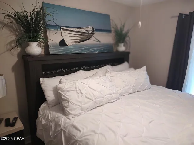 $720,000 | 5833 North Lagoon Drive, Unit A, Panama City Beach, FL 32408