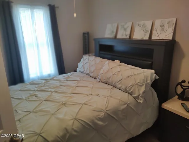 $720,000 | 5833 North Lagoon Drive, Unit A, Panama City Beach, FL 32408