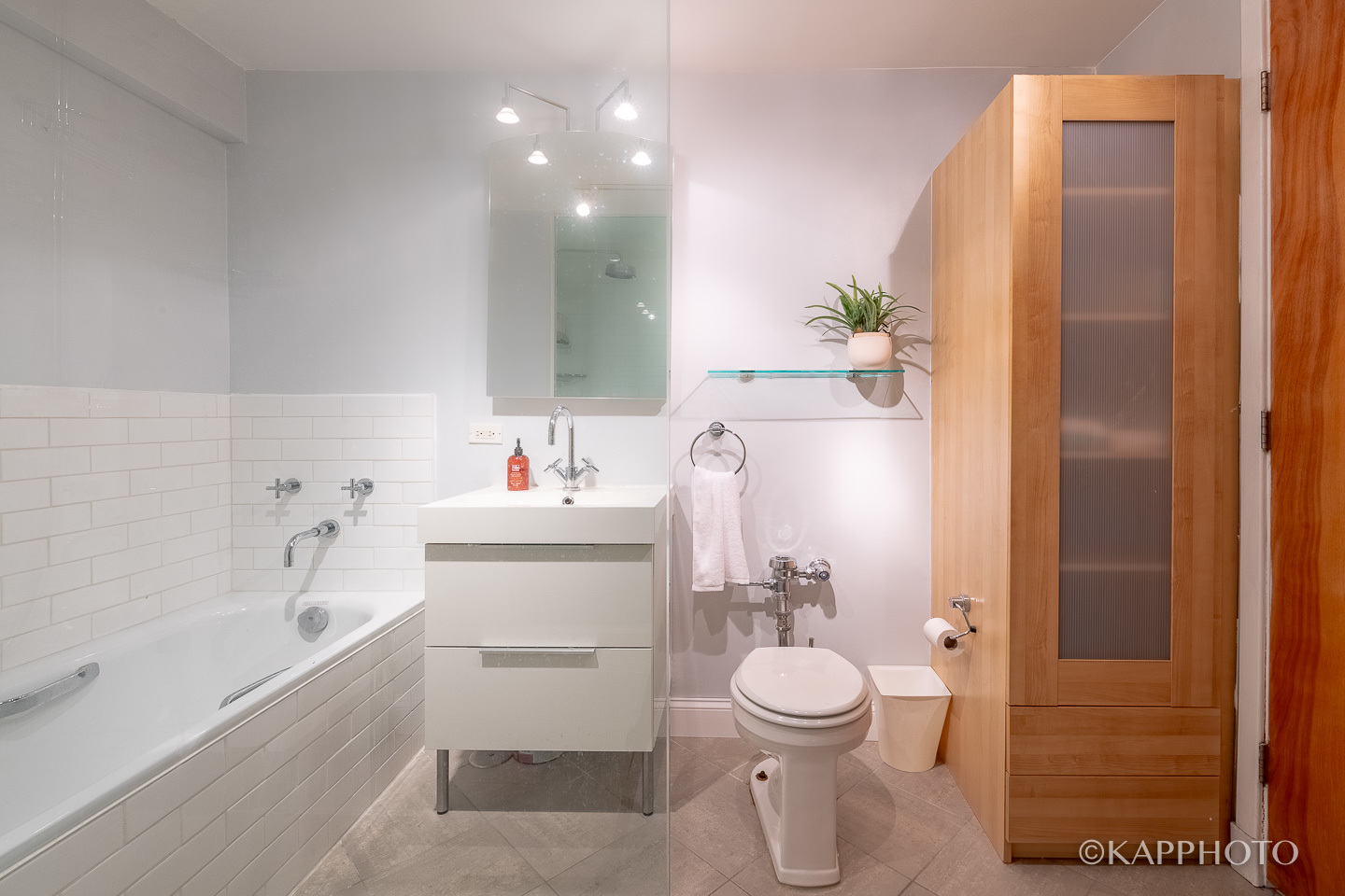 2909 North Sheridan Road, Unit 1807 Chicago, IL 60657 - Photo 15 of 23 a bathroom with a sink a toilet and shower