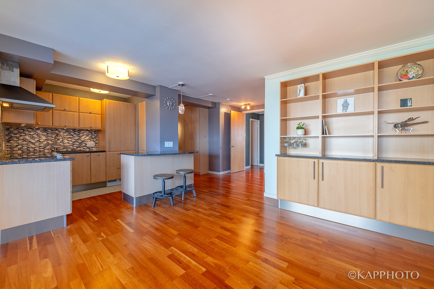 2909 North Sheridan Road, Unit 1807 Chicago, IL 60657 - Photo 19 of 23 a view of a room with wooden floor and furniture