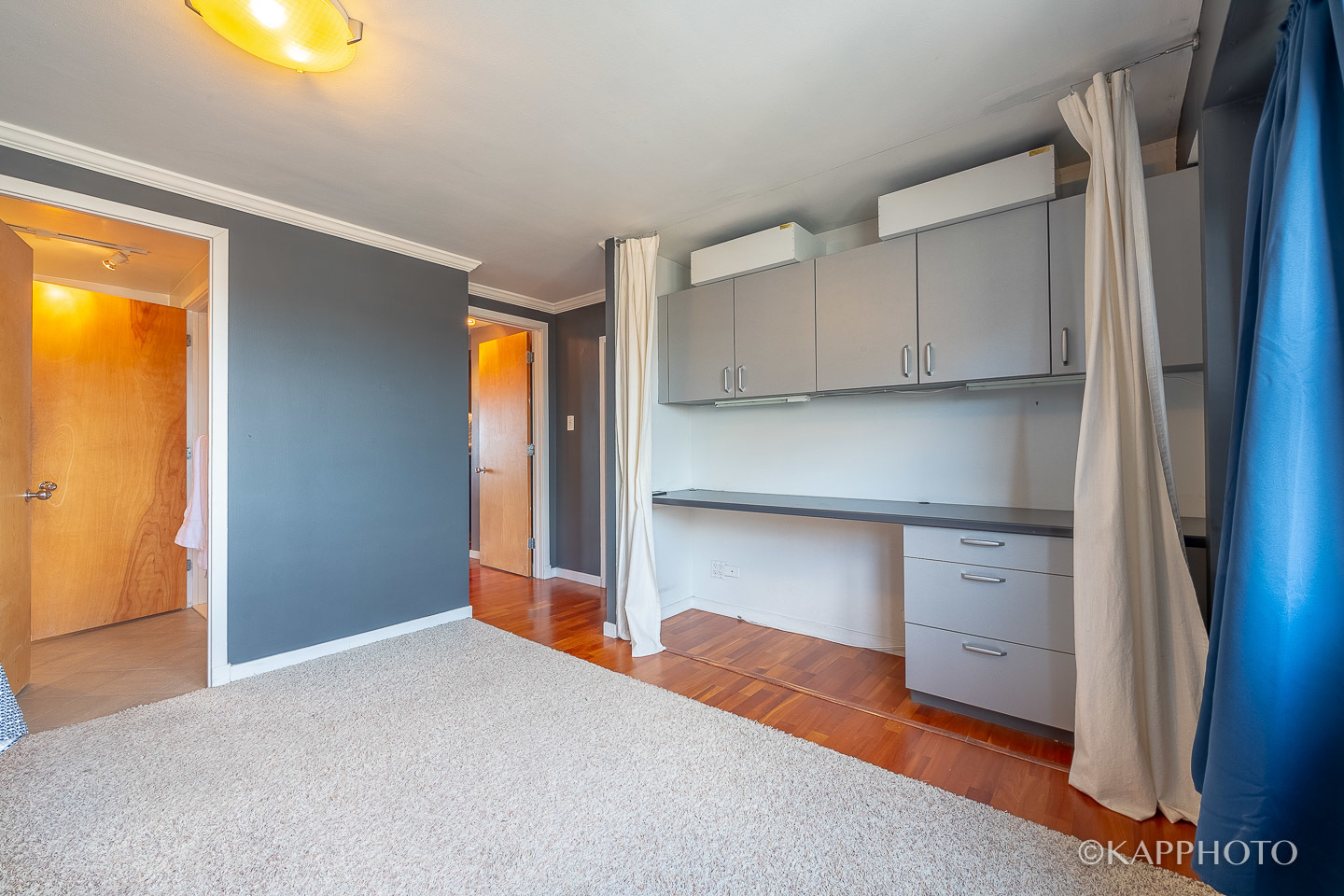 2909 North Sheridan Road, Unit 1807 Chicago, IL 60657 - Photo 9 of 23 a kitchen with a refrigerator and window