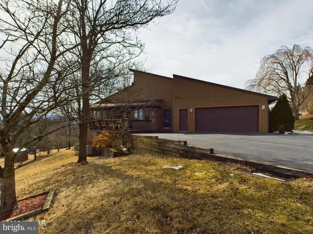 a house view with a swimming pool