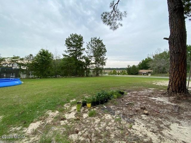 1155 Macedonia Church Road Cochran, GA 31014 - Photo 20 of 22 a view of a garden with a fountain