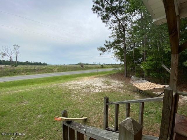1155 Macedonia Church Road Cochran, GA 31014 - Photo 3 of 22 a view of a swimming pool with an ocean view