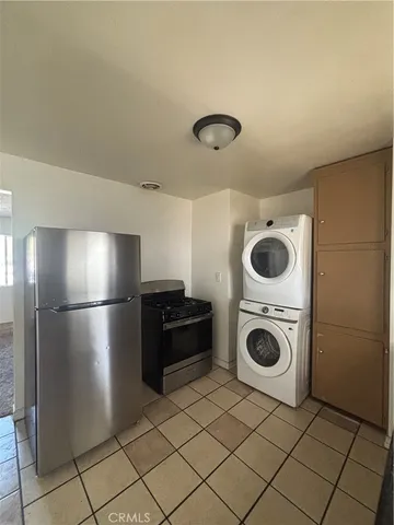 a view of kitchen with washer and dryer