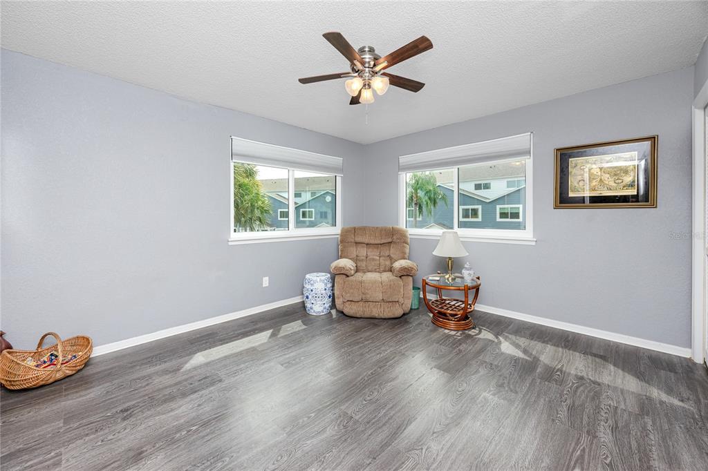 816 Hidden Harbour Drive Indian Rocks Beach, FL 33785 - Photo 18 of 58 a living room with furniture and a window