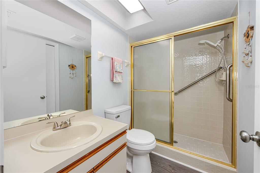 816 Hidden Harbour Drive Indian Rocks Beach, FL 33785 - Photo 20 of 58 a bathroom with a sink and a mirror