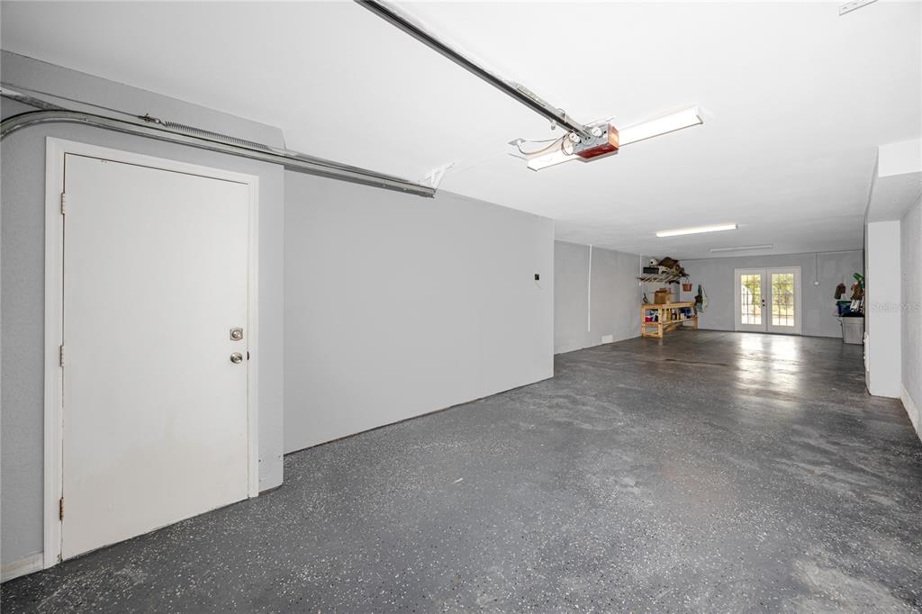 816 Hidden Harbour Drive Indian Rocks Beach, FL 33785 - Photo 34 of 58 a view of empty room with wooden floor